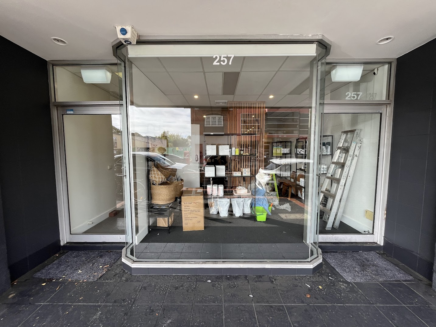 Shopfront with frosting removed and glass detailed — after